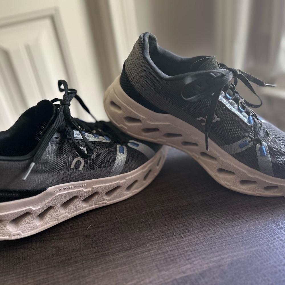 On Running Black and White Athletic Shoes with Dynamic Comfort